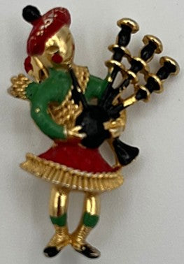 Enameled Piper Brooch
